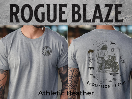 The image is a collage of two photos featuring a gray t-shirt with a graphic design on the back. The design depicts a man riding a motorcycle, with various symbols and elements surrounding him. The text above the image reads &quot;ROGUE BLAZE&quot; and below the image, it says &quot;Athletic Heather&quot;.